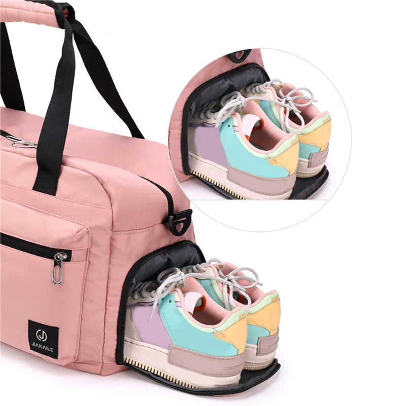 Pink AliExpress women's travel handbag with separate shoe compartment and black handles