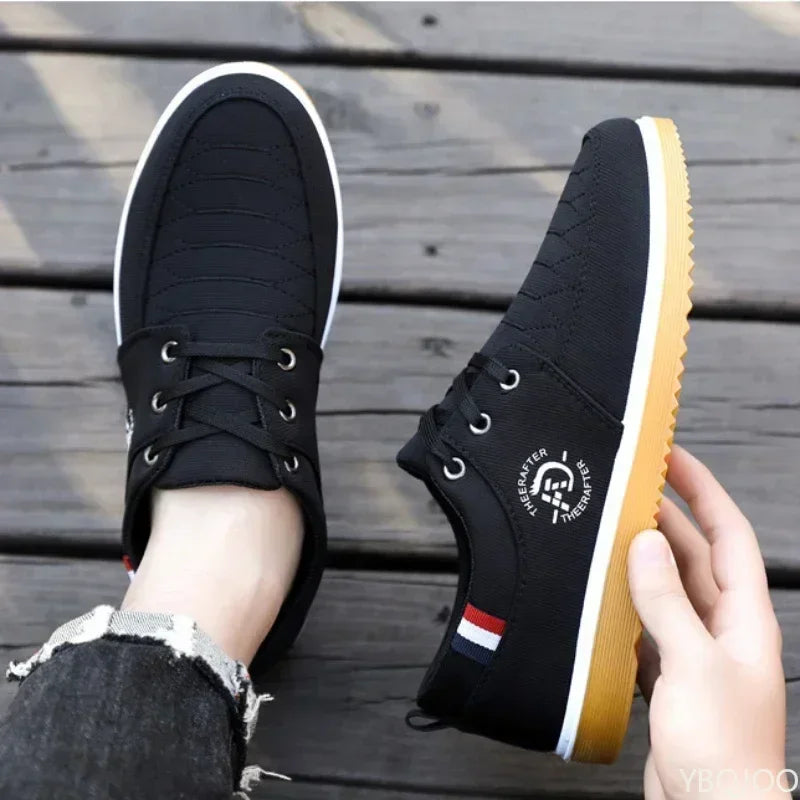 Black casual walking shoes for men with white soles and lace-up design 